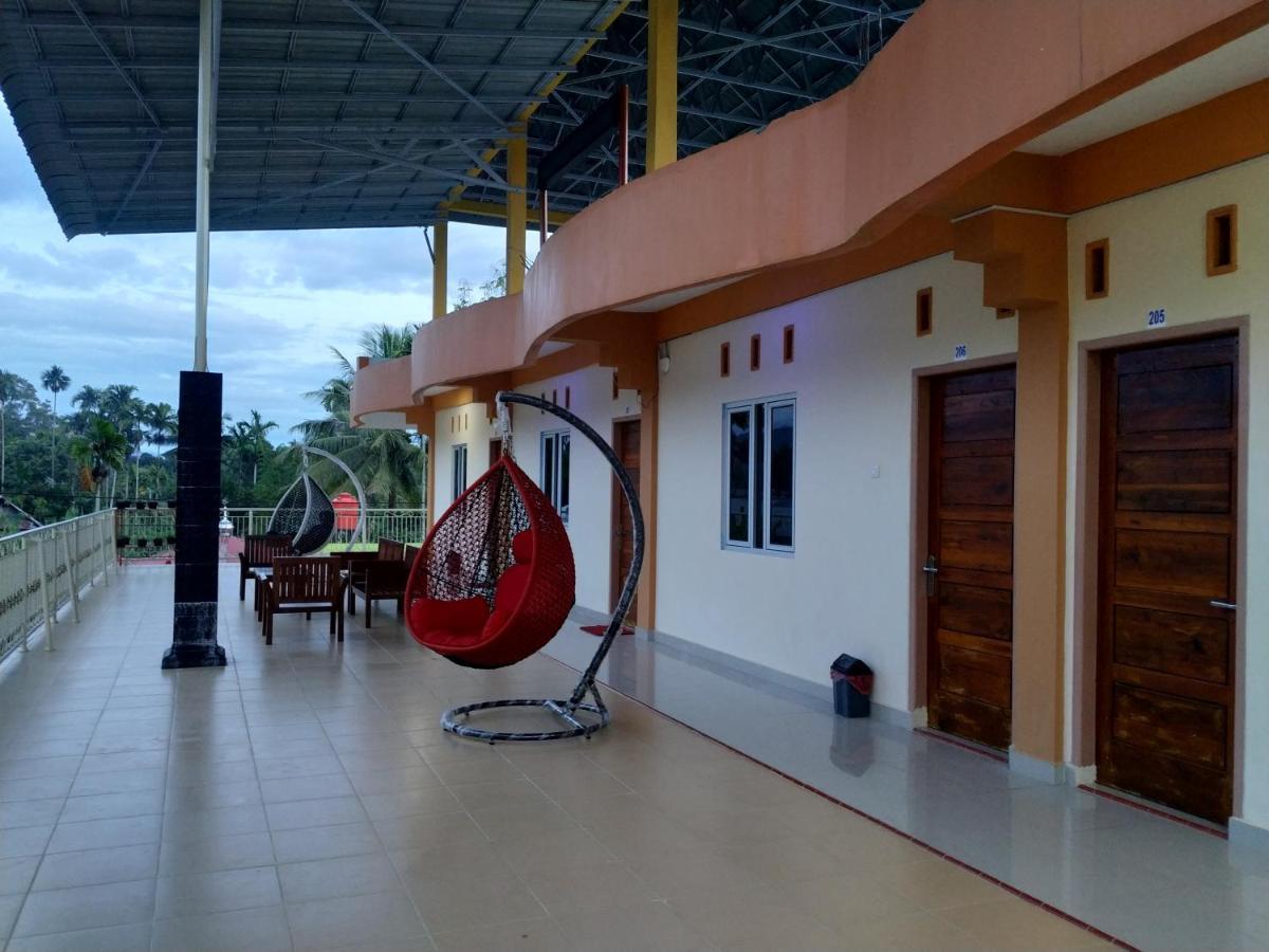 ホテル Penginapan Intan Bandara パダン エクステリア 写真